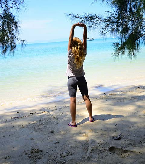 On the beach in shorts